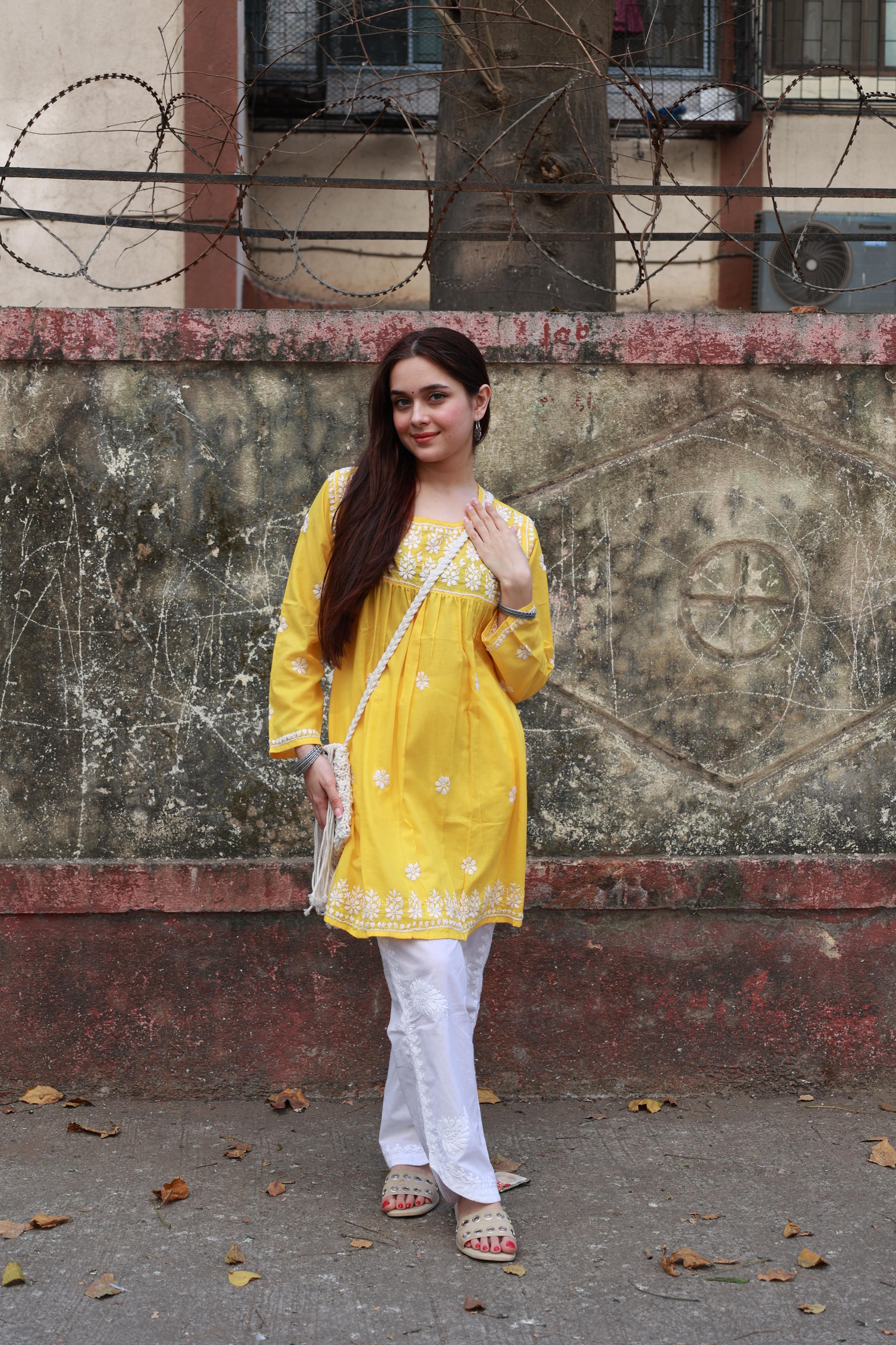 Rishita in Cotton Chikankari Short Kurta in Yellow