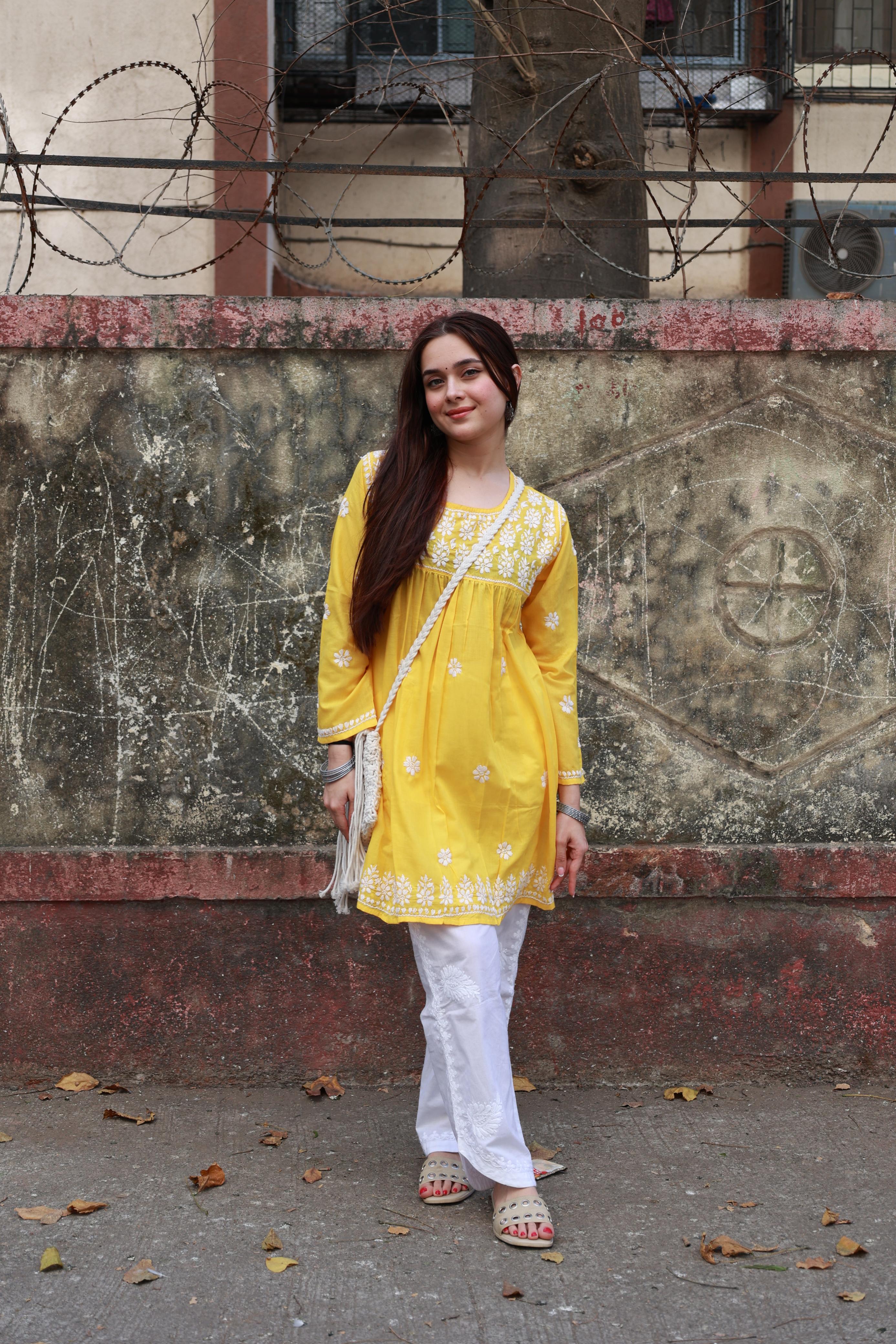 Rishita in Cotton Chikankari Short Kurta in Yellow